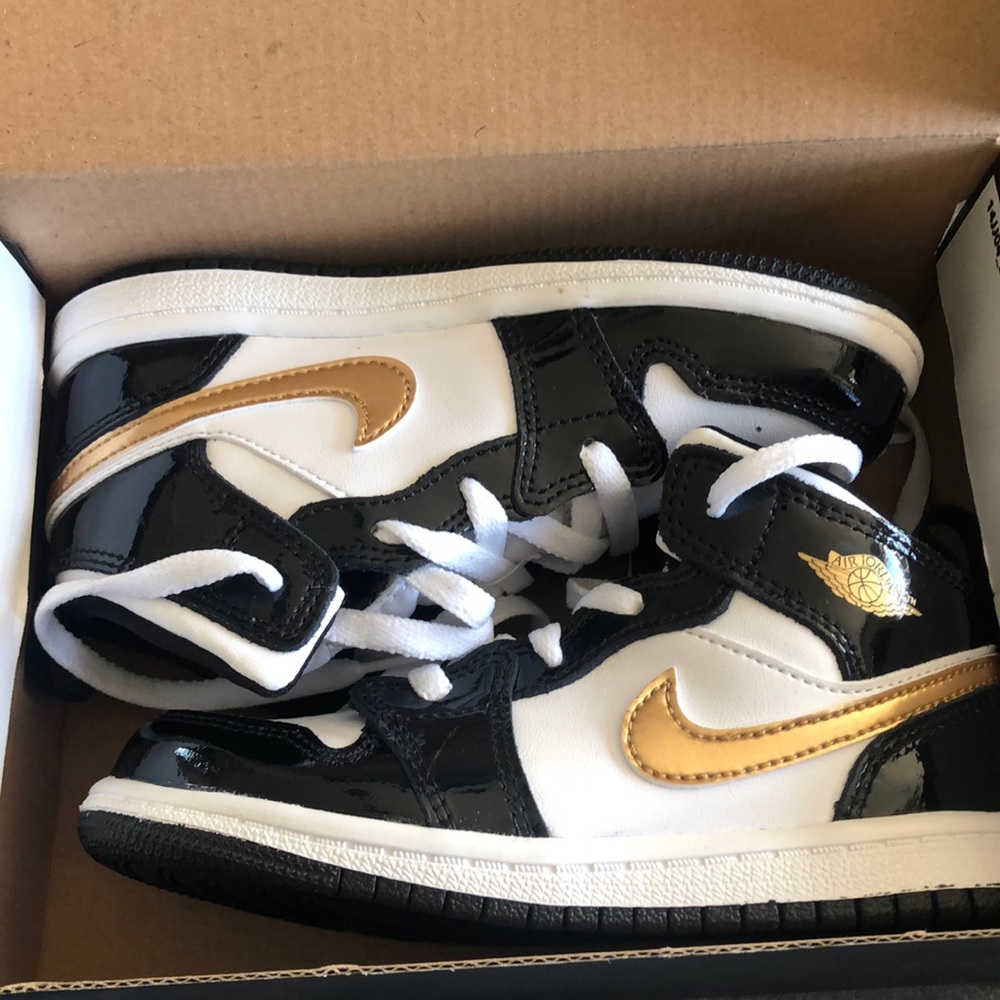 Black and Gold Nike Toddler Jordan’s